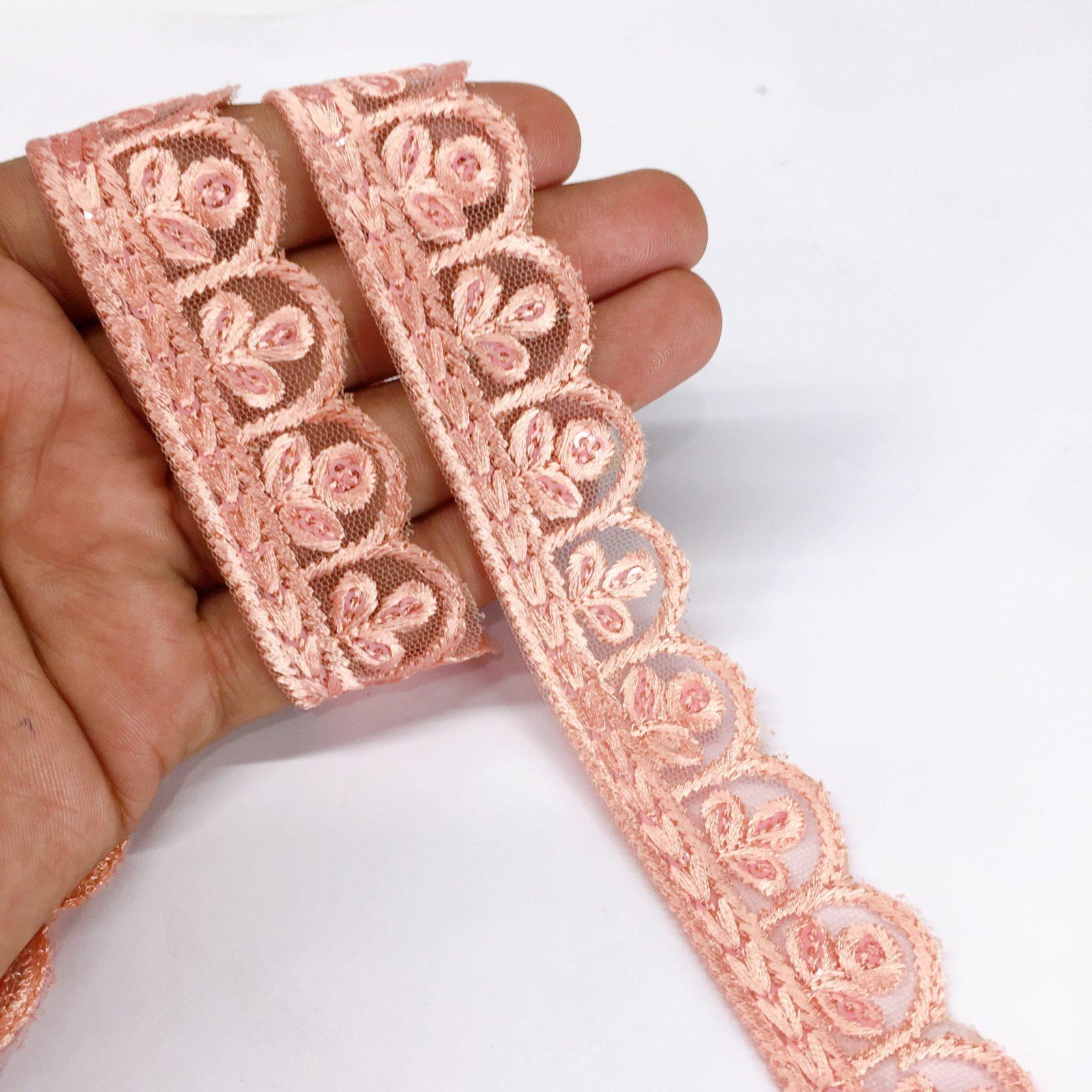 25mm Jute Flower Design Embroidery Cutwork lace with Matching Sequins Work Border, shown on white cotton