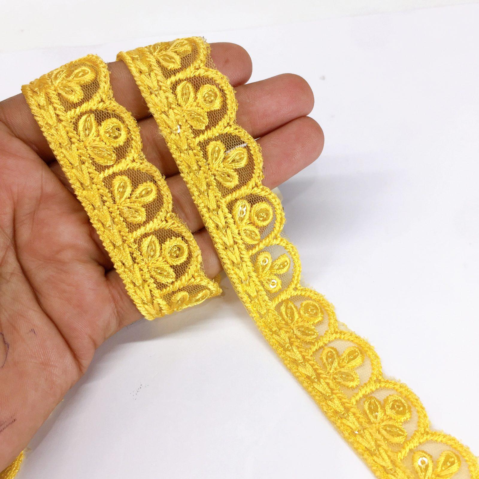 25mm Jute Flower Design Embroidery Cutwork lace with Matching Sequins Work Border, shown on white cotton