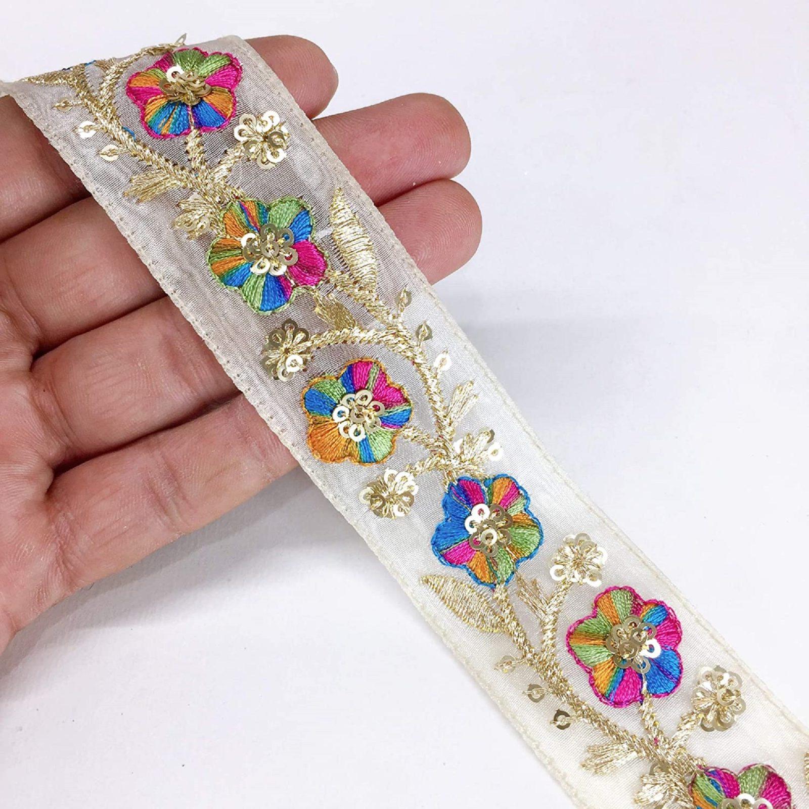 30mm Flower Design Embroidery Work and Sequins Work Ribbon, shown on white cotton