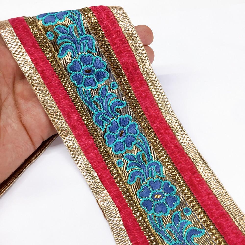 80mm tomato flower design with velvet and sequin, shown on white cotton