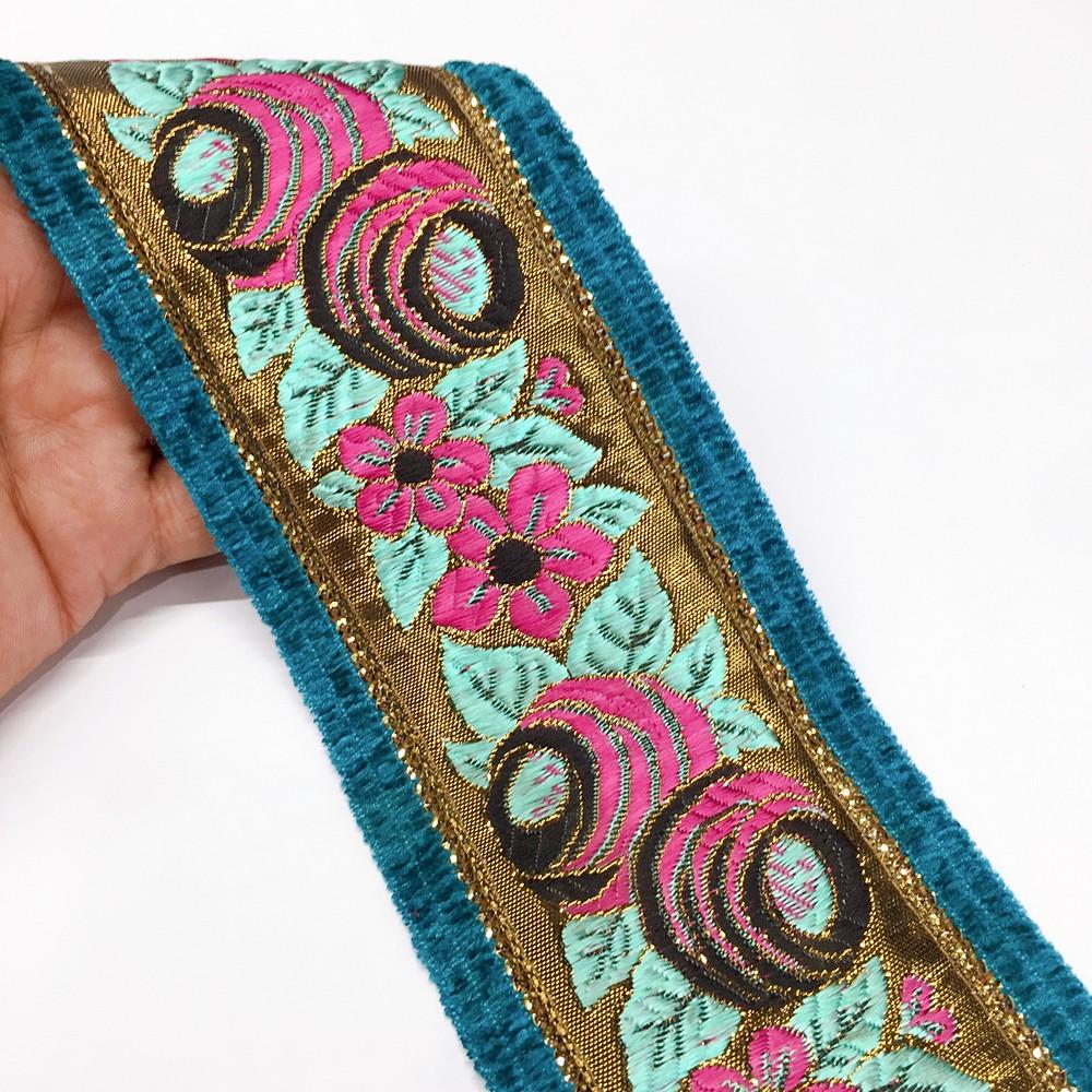 80mm Sky Blue grey flower design with velvet and sequin, shown on white cotton