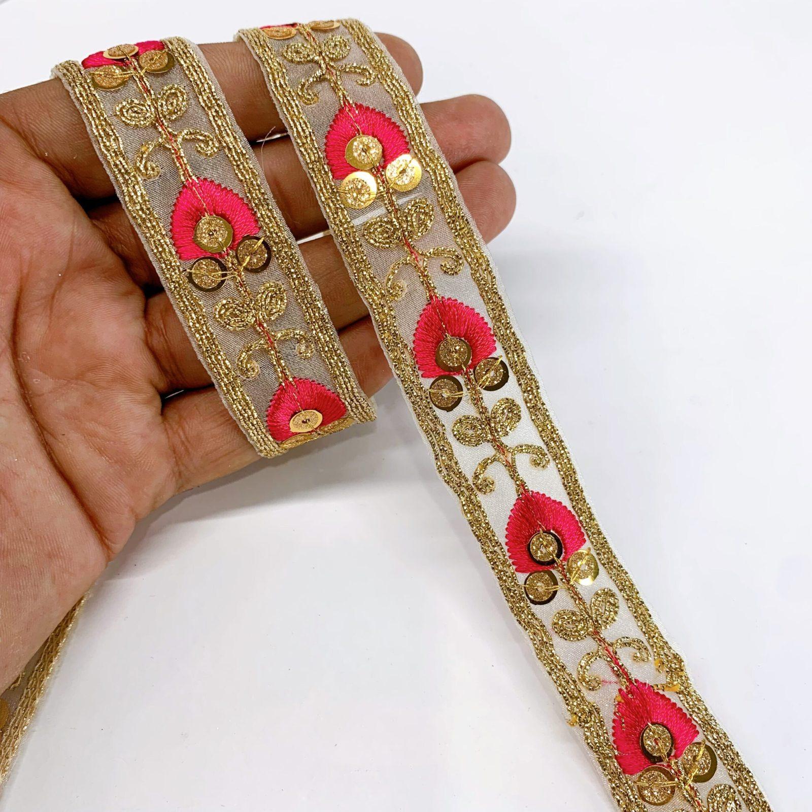 20mm Leaf Design Embroidery lace with Golden Sequins and Dori Work Border, shown on white cotton