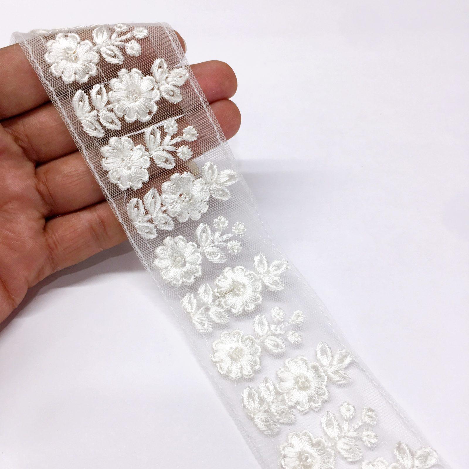 40mm Flower Design Embroidery lace with Flower Matching Sequins Work Border, shown on white cotton
