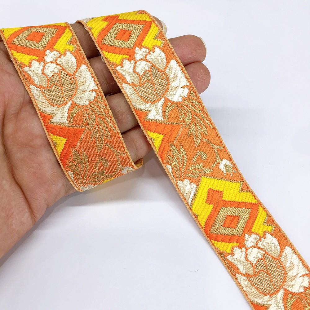30mm Flower Jacquard Woven, shown on white cotton