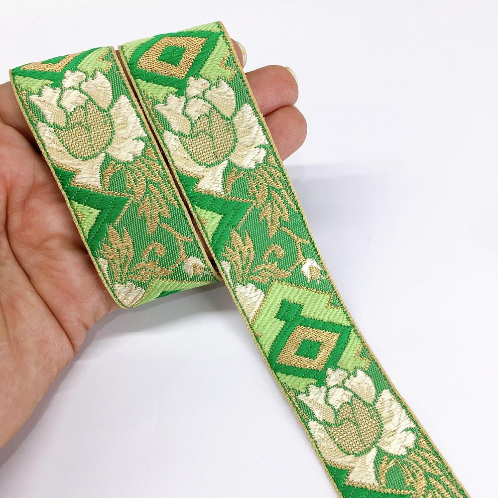 30mm Flower Jacquard Woven, shown on white cotton