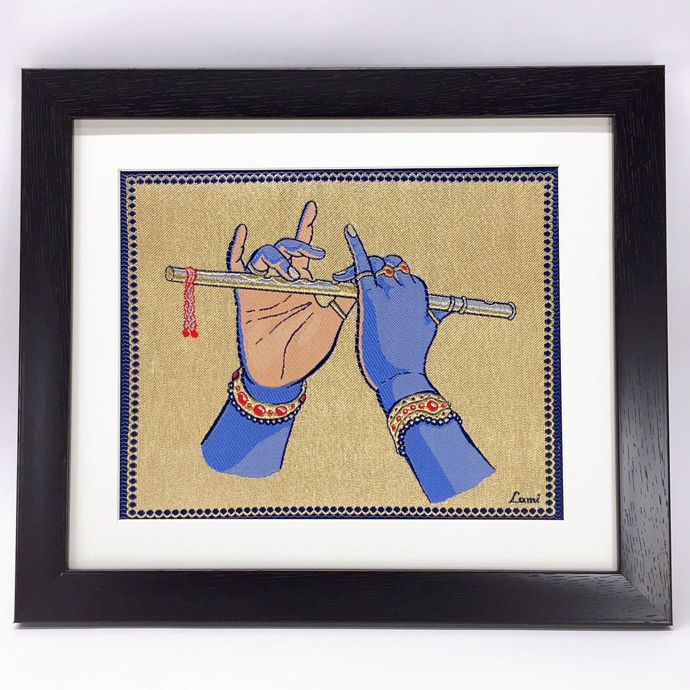Lami Woven Krishna Hand Art Frame, shown on white cotton