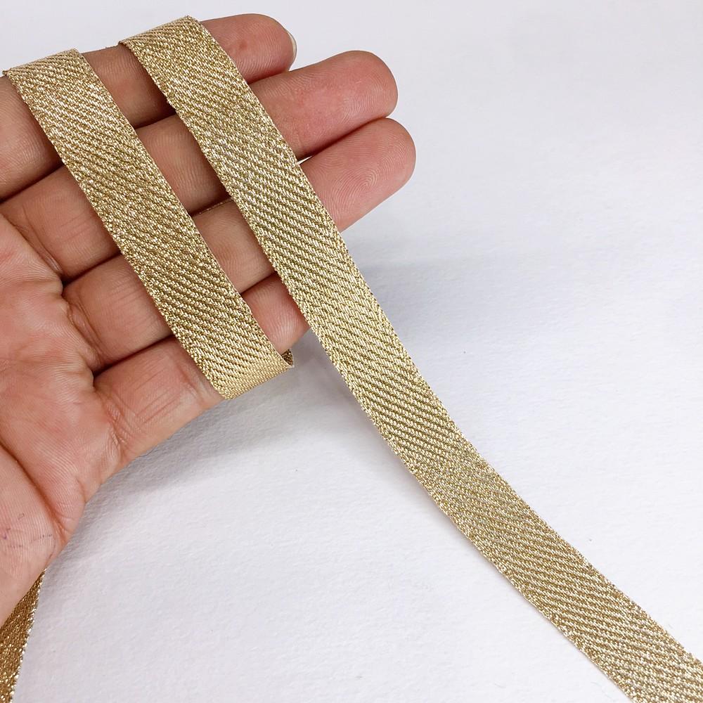 15 mm Metallic Glitter Twill Weave Ribbon, shown on white cotton