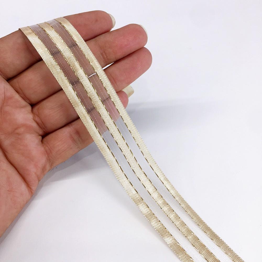 24 mm Metallic Glitter Twill Weave Ribbon, shown on white cotton