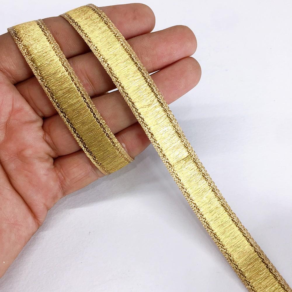13 mm Thick Gold Metallic Zari Ribbon, shown on white cotton