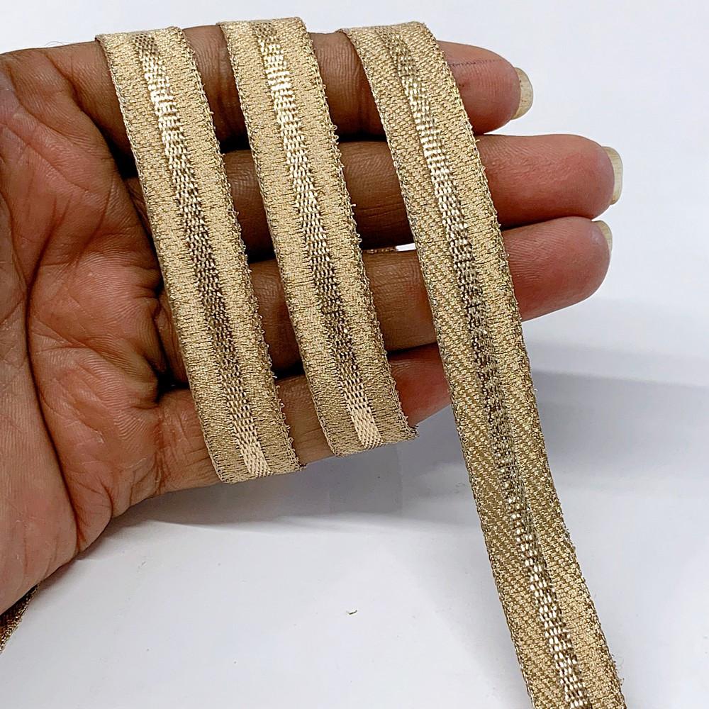 14 mm Thick Gold Metallic Zari Ribbon with Shiny Stripe, shown on white cotton