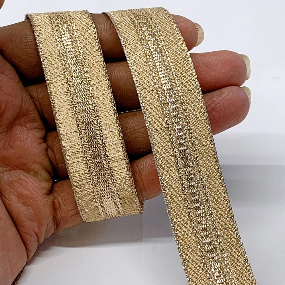 21 mm Thick Gold Metallic Zari Ribbon with Shiny Stripe, shown on white cotton