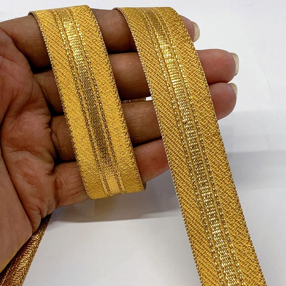 21 mm Thick Gold Metallic Zari Ribbon with Shiny Stripe, shown on white cotton