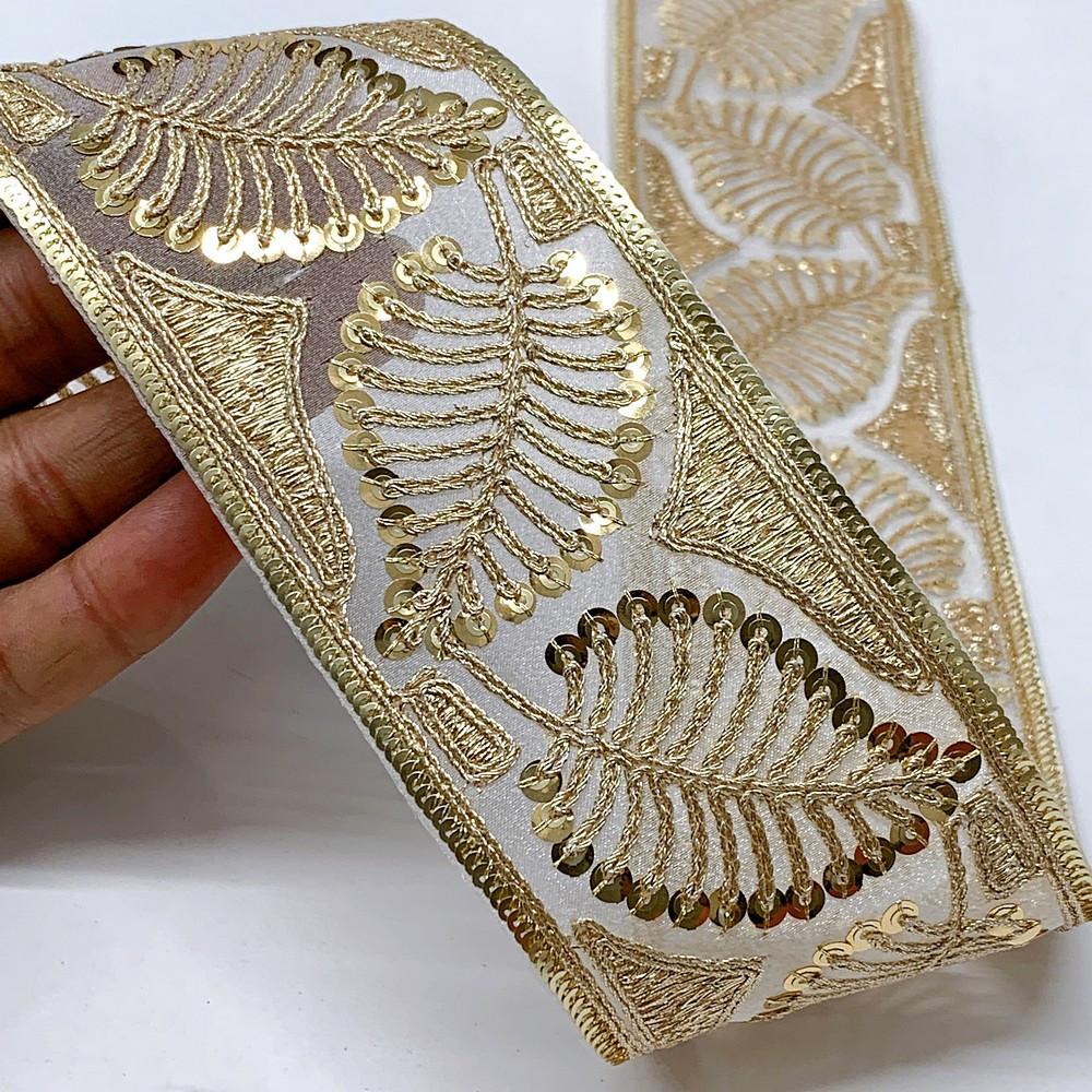 60mm Leaf Design Sequins Embroidery Lace With Dori Work, shown on white cotton