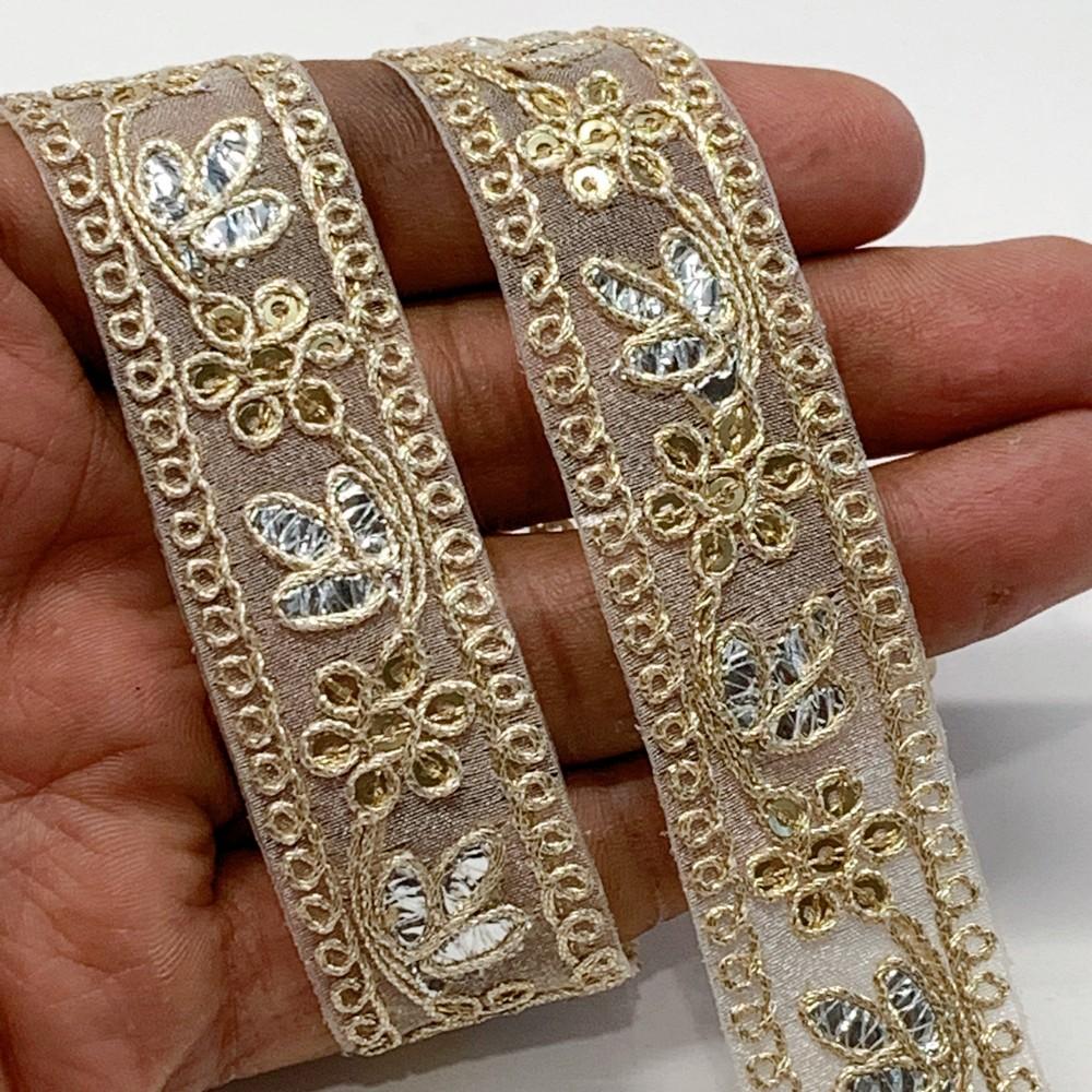 24mm Designer Sequins Embroidery Lace With Dori Work and Silver Foil, shown on white cotton
