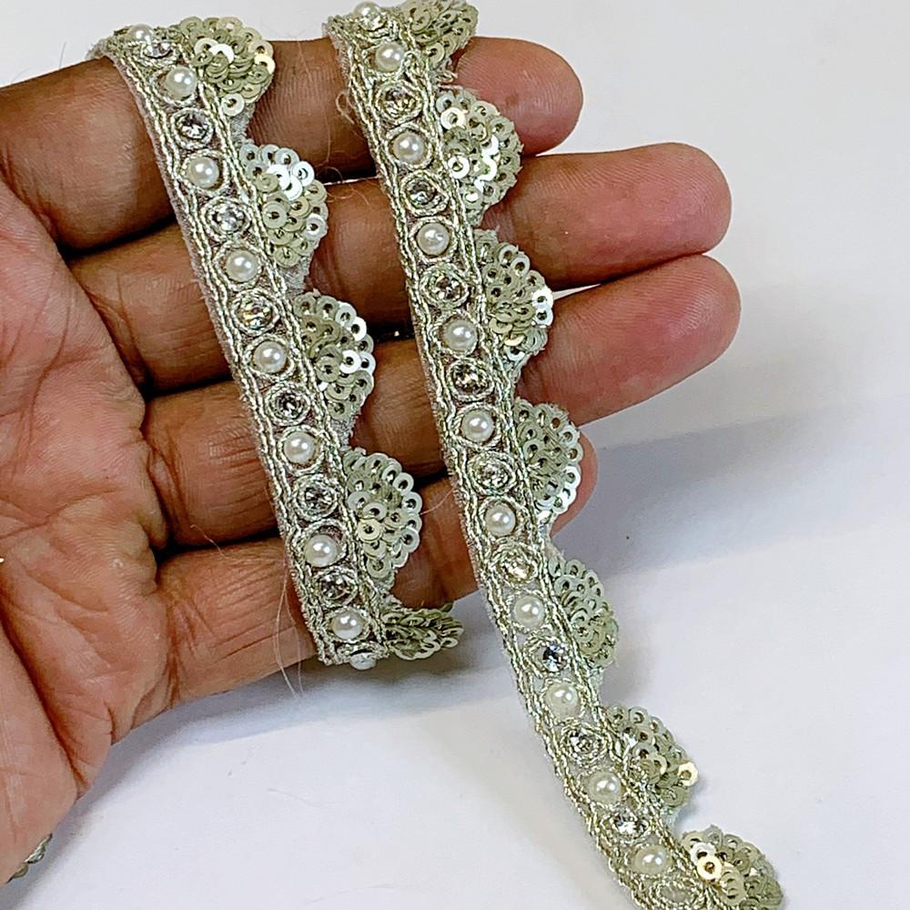 16mm Designer Cutwork Sequins Embroidery Lace With Stones And Dori Work, shown on white cotton