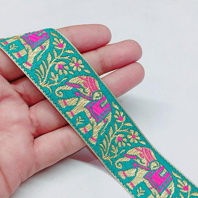 30mm Banarasi Jacquard Elephant Designer Ribbon, shown on white cotton