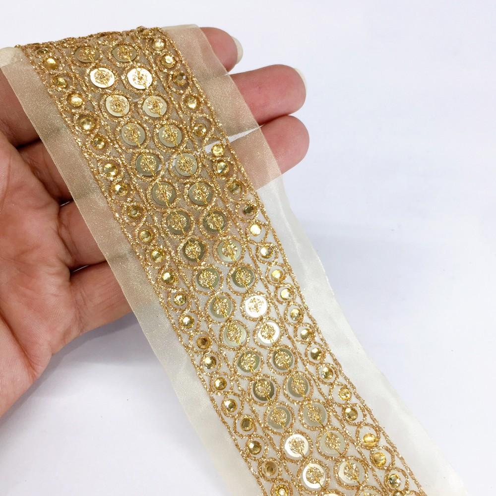 38 mm Designer Sequins Embroidery Lace With Dori Work, shown on white cotton