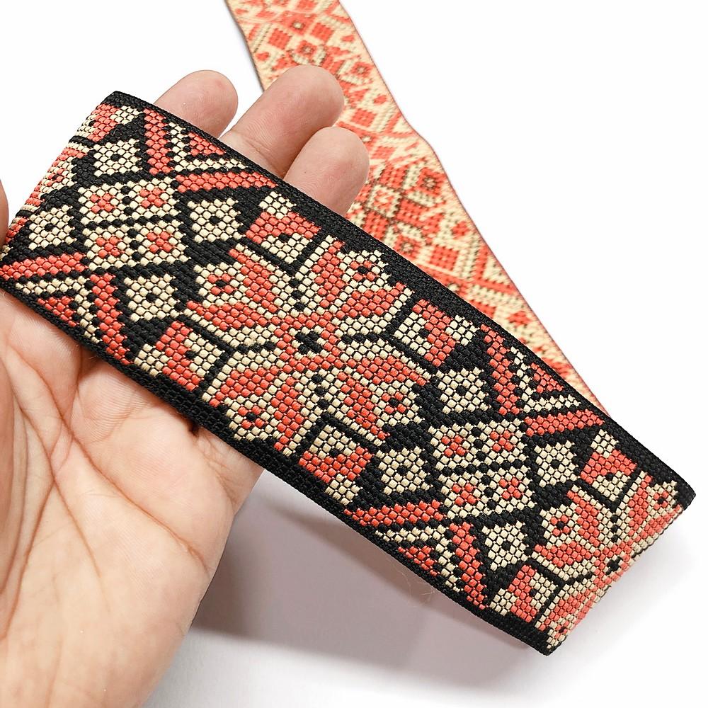 56 mm Geometric Flower Jacquard Ribbon, shown on white cotton