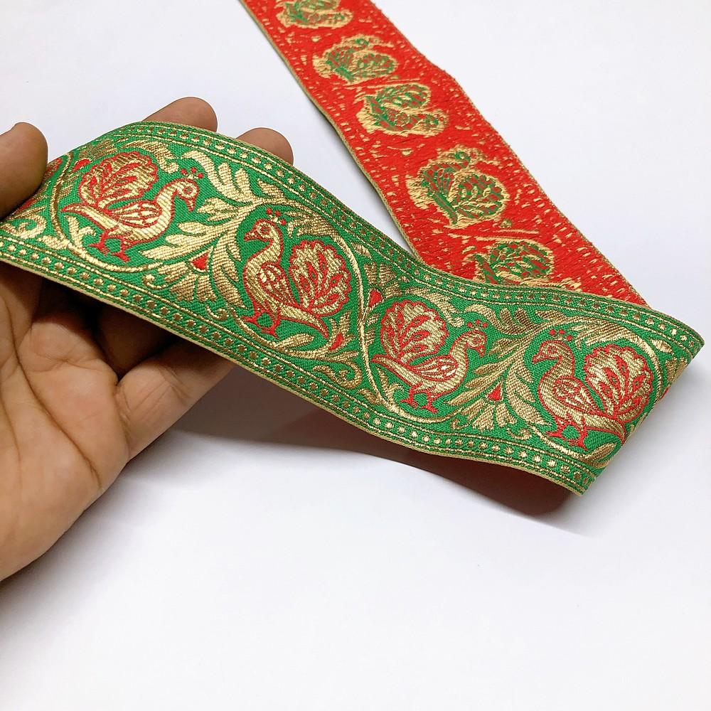 60mm Peacock Design Banarasi Jacquard Lace, shown on white cotton