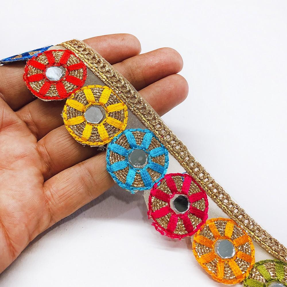 35mm Designer Round Cutwork Embroidery Lace With Mirror Work, shown on white cotton