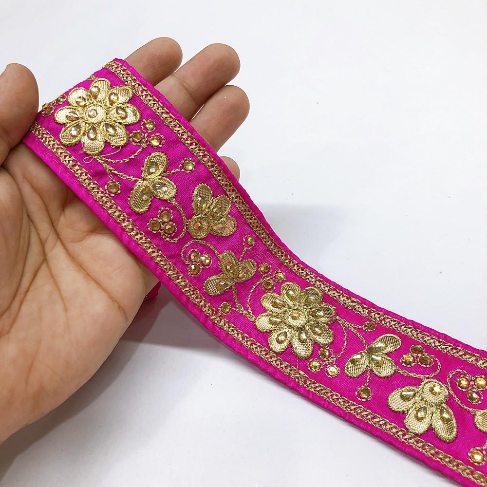 50mm Designer Embroidery Lace With Stone Work, shown on white cotton