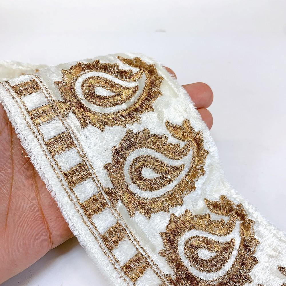 90mm Designer Cotton Embroidery Lace, shown on white cotton