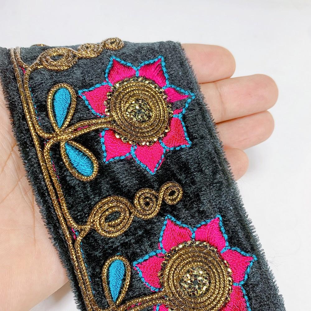 65mm Designer Standing Flower Embroidery Lace With Sequins Work, shown on white cotton