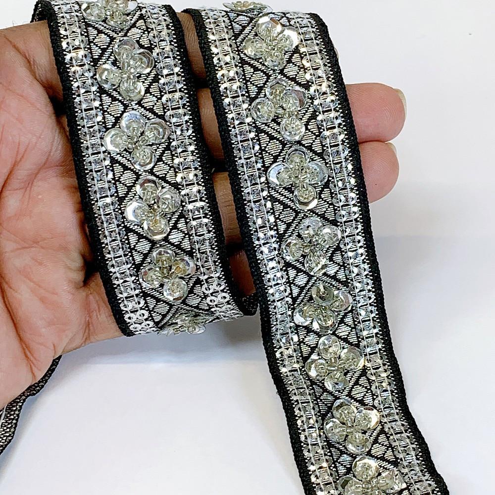 30mm Designer Jacquard Lace With Sequins Work, shown on white cotton