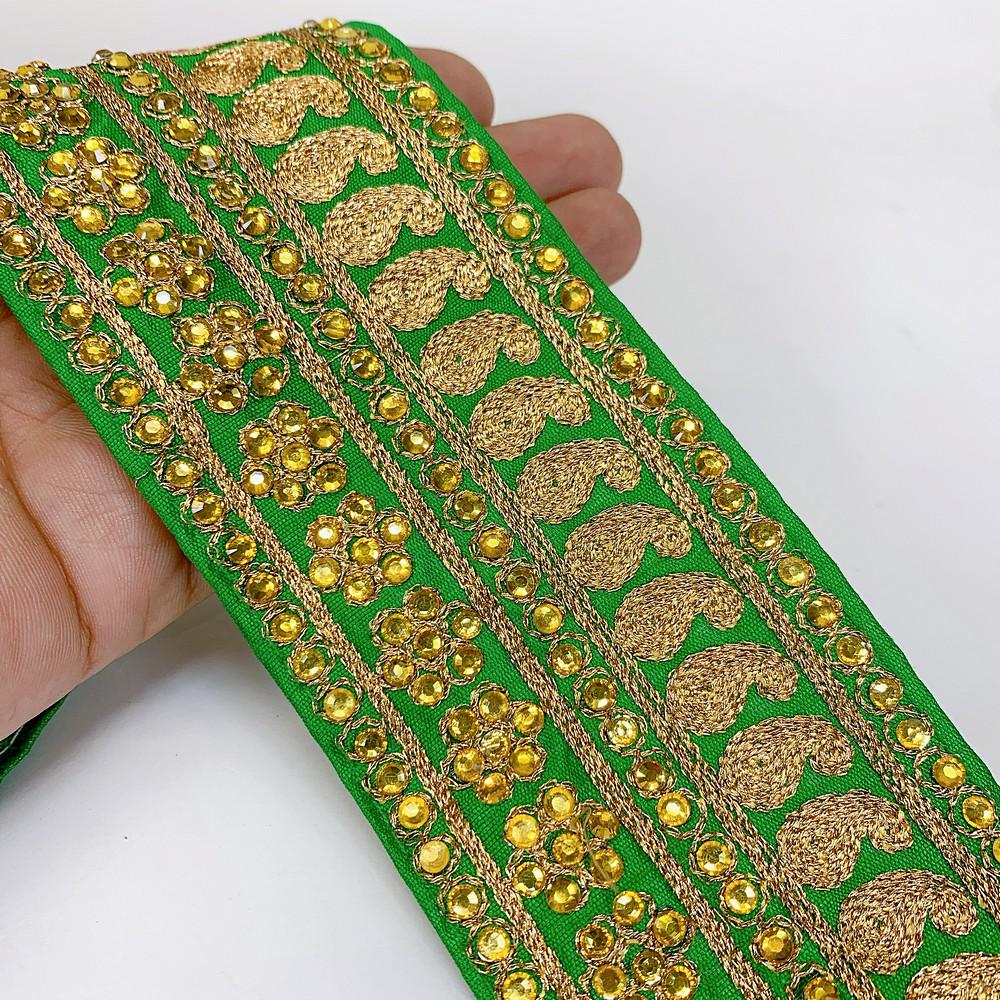 66 mm Designer Embroidery Lace With Stone Work, shown on white cotton