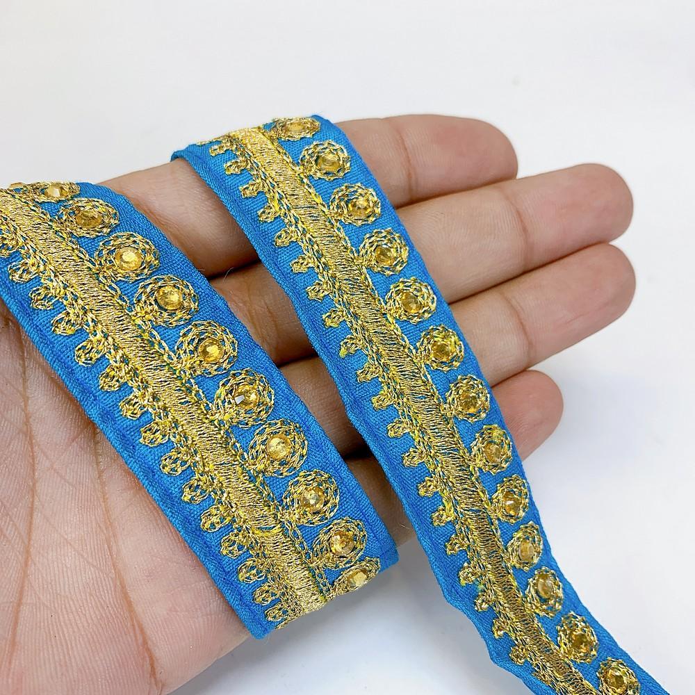 25mm Designer Embroidery Lace With Stone Work, shown on white cotton