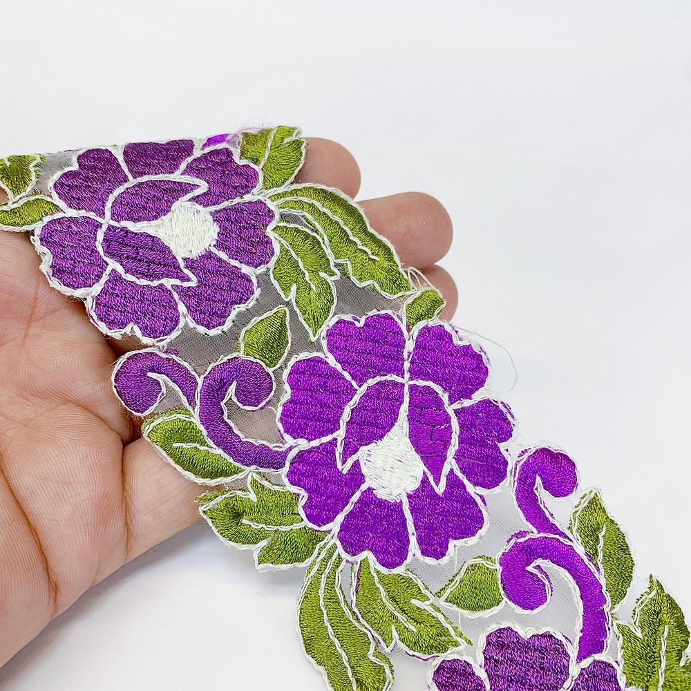 65mm Designer Cutwork Embroidery Colorful Parsi Lace, shown on white cotton