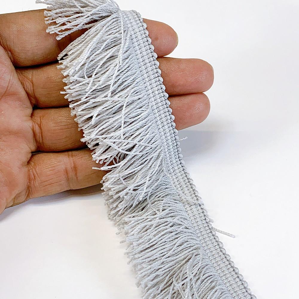 40mm Light Purple Designer Polyester Fringe, shown on white cotton