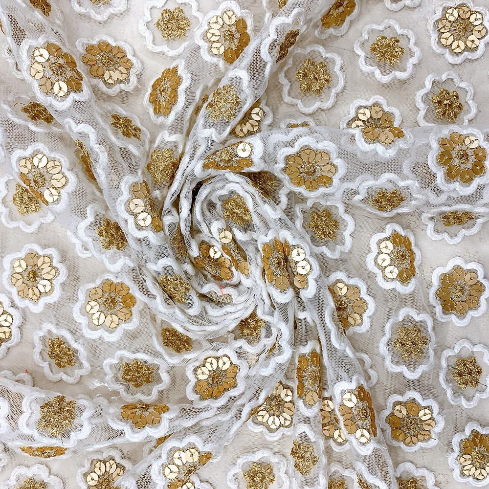 Embroidery Work On Net Fabric, shown on white cotton