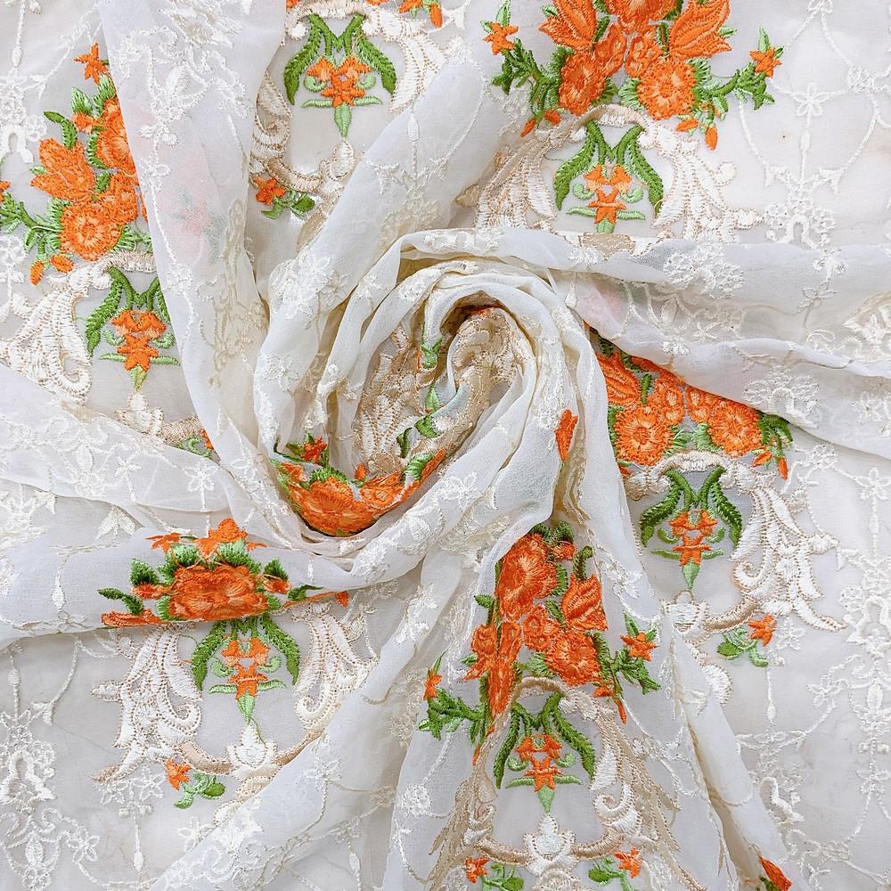 Embroidery Butta Work On Georgette Fabric, shown on white cotton