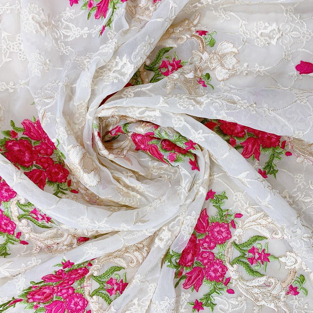 Embroidery Butta Work On Georgette Fabric, shown on white cotton