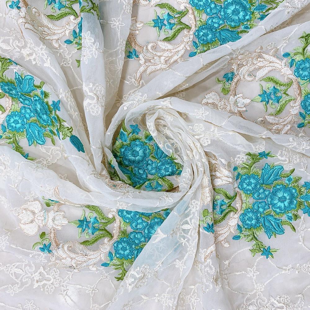 Embroidery Butta Work On Georgette Fabric, shown on white cotton