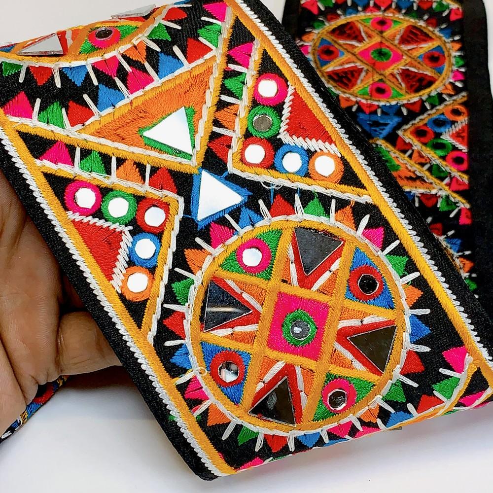 90mm Designer Kutchi Multicolour Embroidery Lace With Mirror Work, shown on white cotton