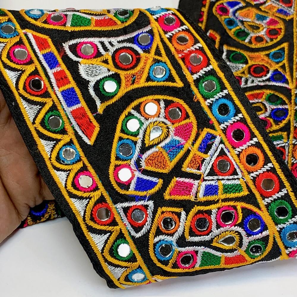 95mm Designer Kutchi Multicolour Embroidery Lace With Mirror Work, shown on white cotton