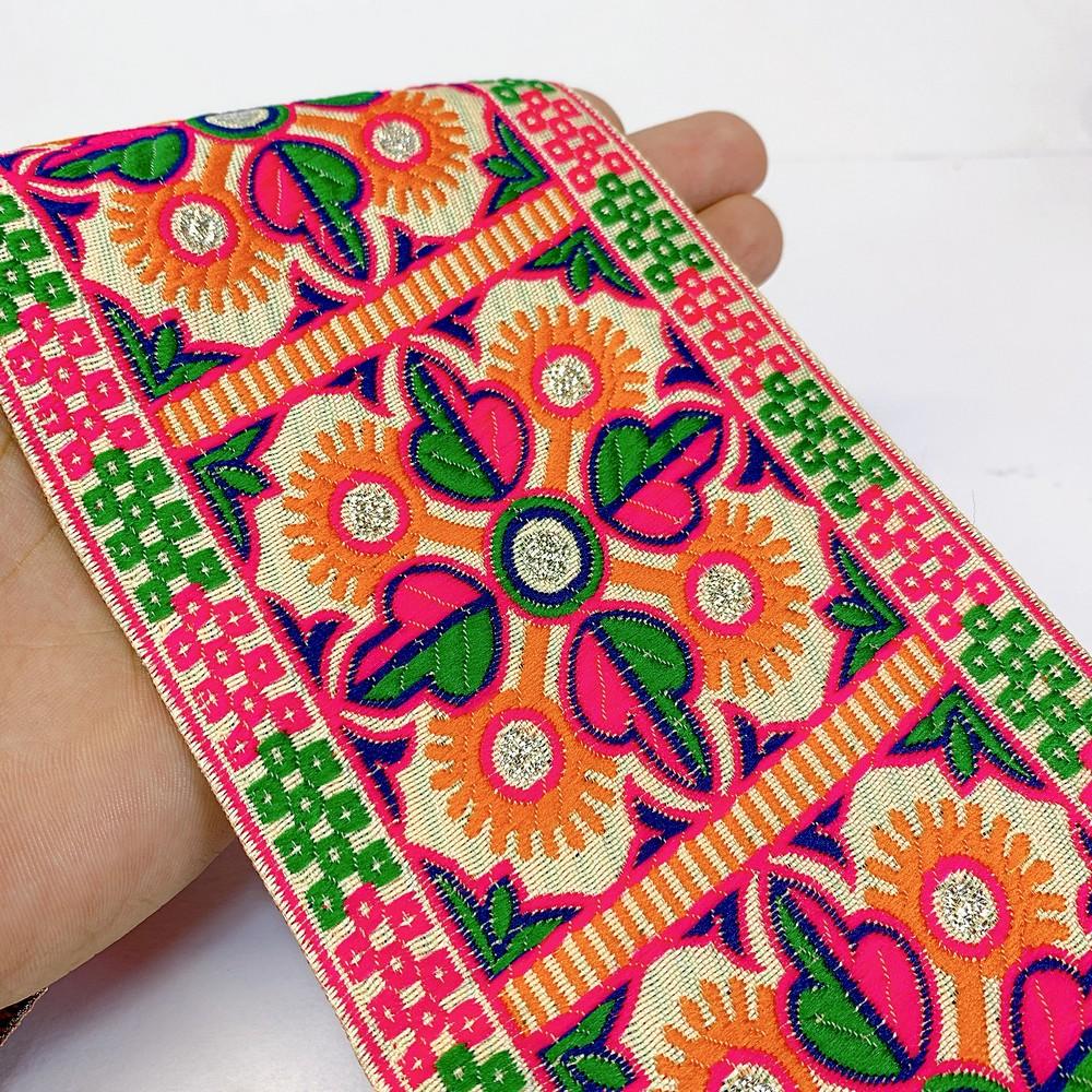 100mm Kutchi Design Jacquard Lace With Zari Work, shown on white cotton