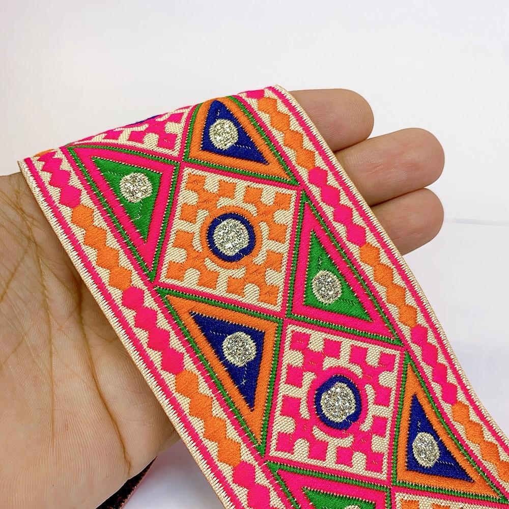 66 mm Kutchi Design Jacquard Lace With Zari Work, shown on white cotton