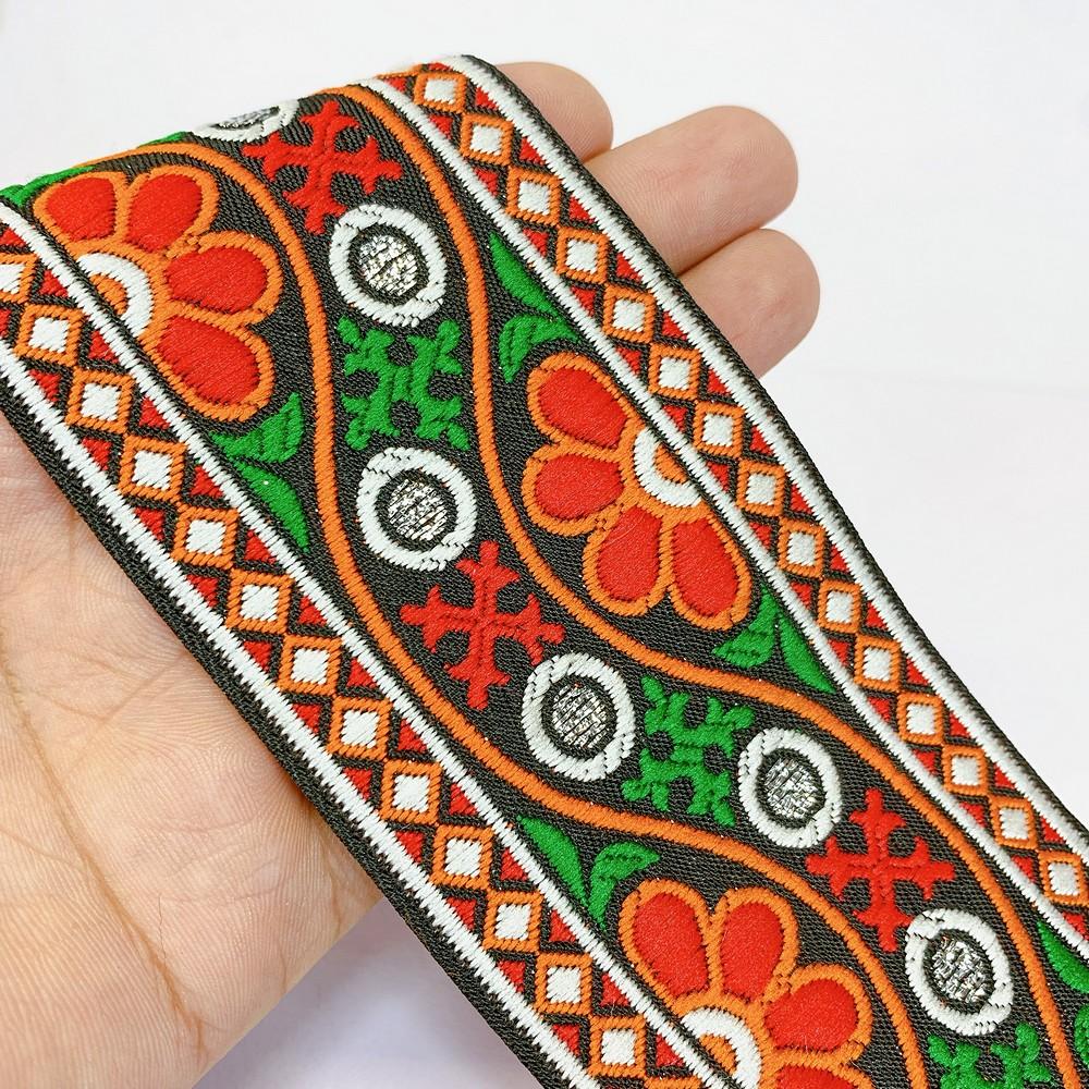 66 mm Kutchi Design Jacquard Lace With Zari Work, shown on white cotton
