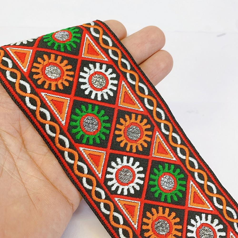 66 mm Kutchi Design Jacquard Lace With Zari Work, shown on white cotton