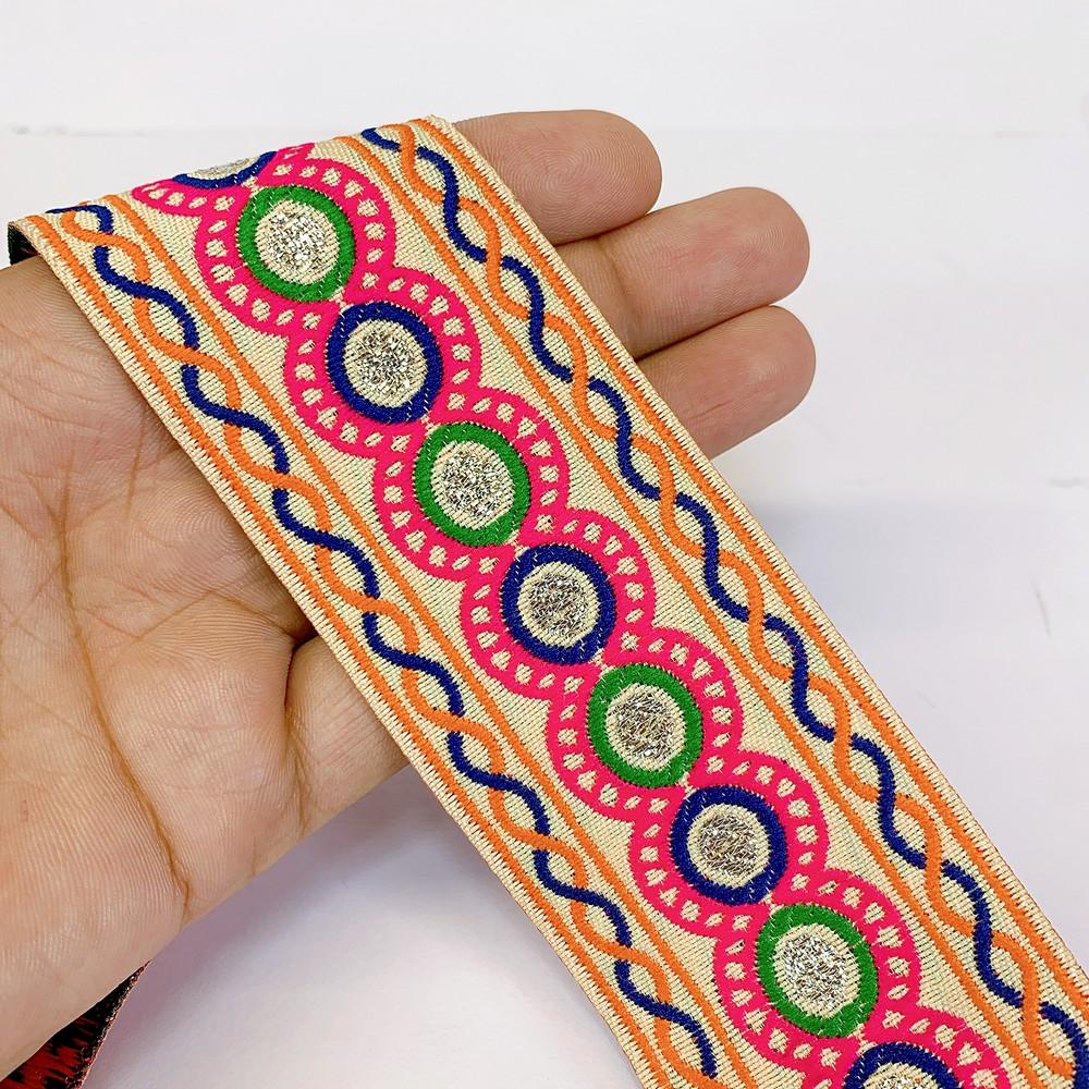 48 mm Kutchi Design Jacquard Lace With Zari Work, shown on white cotton