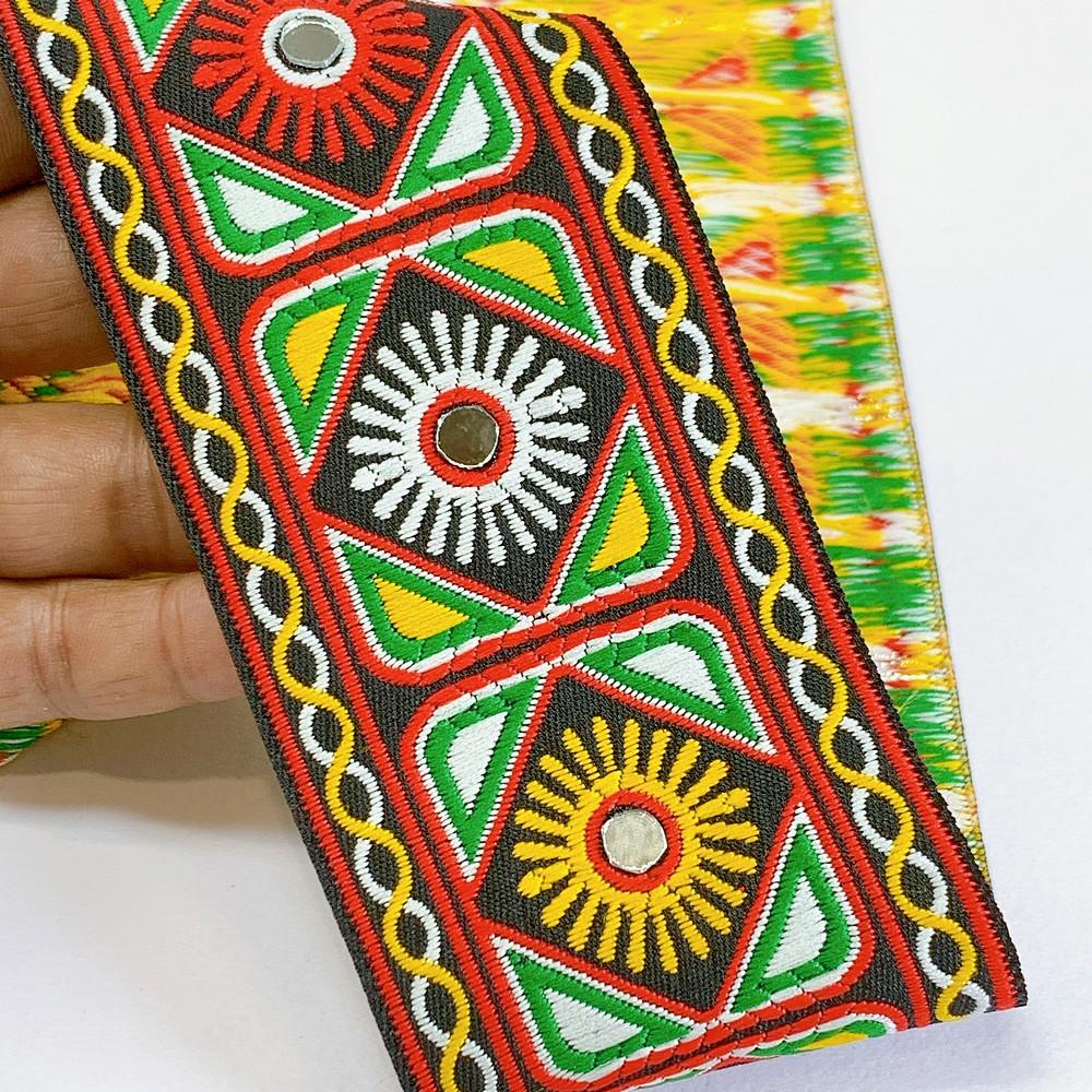 66 mm Kutchi Design Jacquard Lace With Zari Work, shown on white cotton