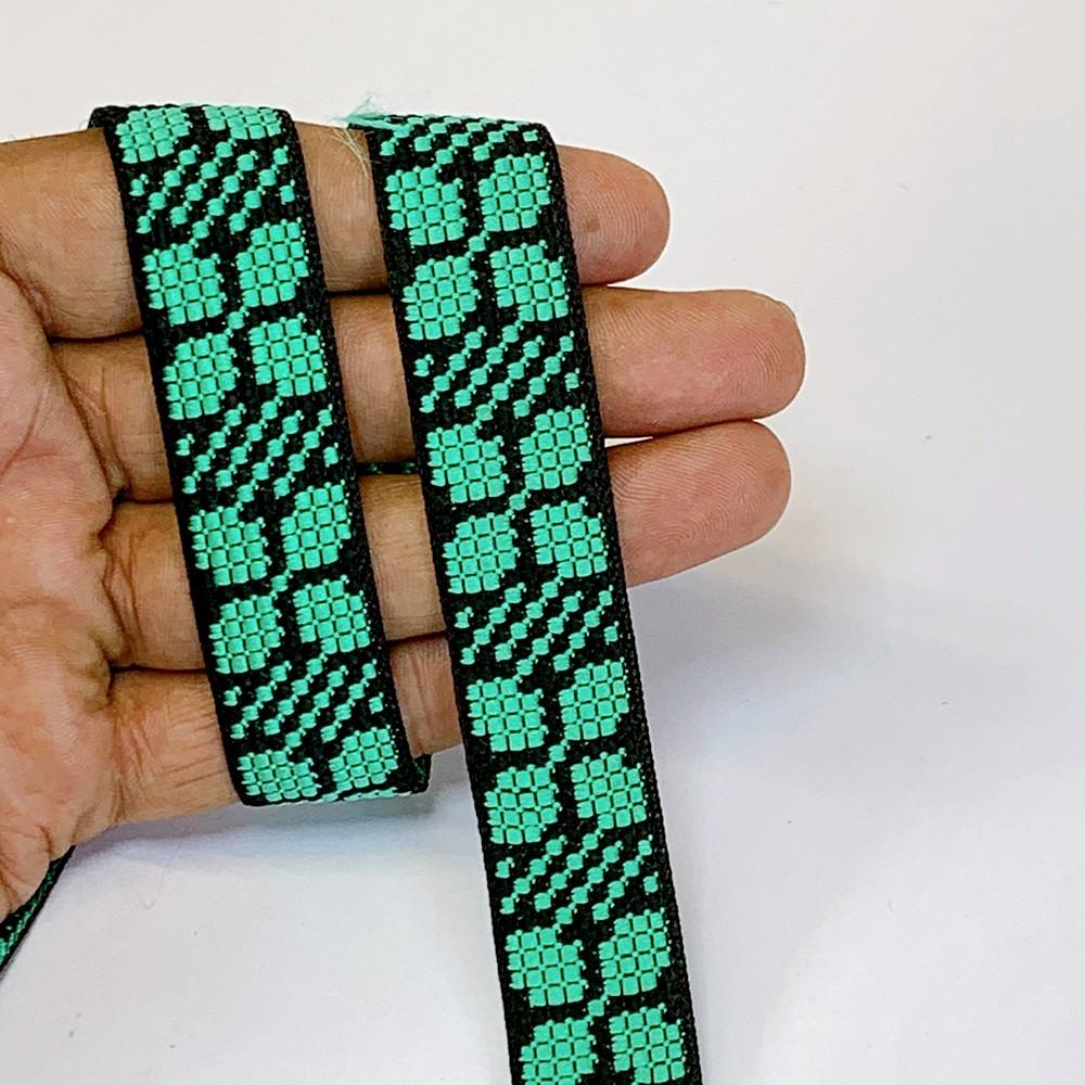 20mm Colorful Cross stich Jacquard Lace, shown on white cotton