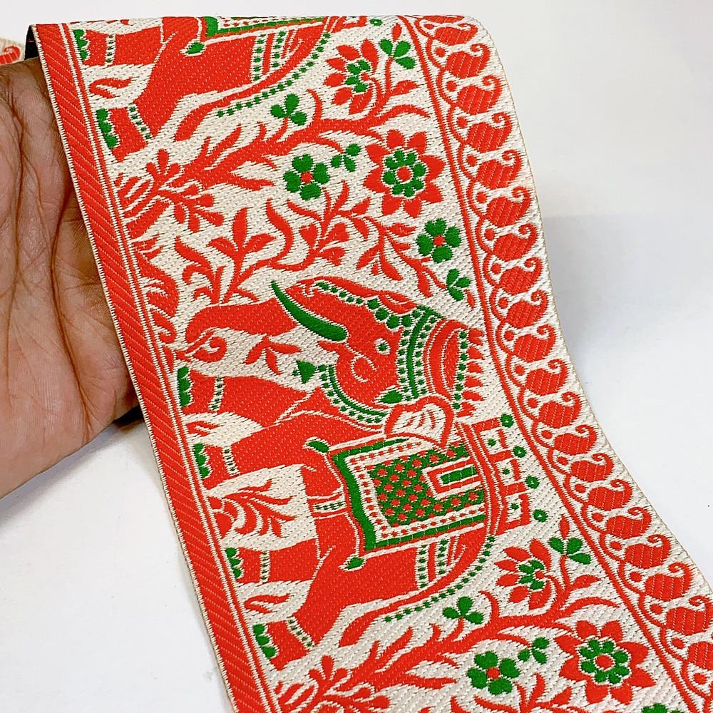 100mm Elephant Design Banarasi Jacquard Lace, shown on white cotton