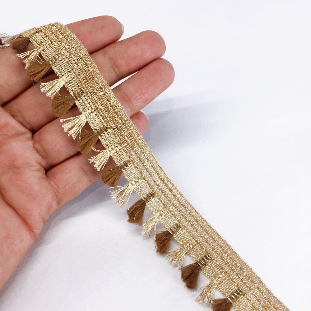 25mm Crochet Knitted Decorative Ribbon, shown on white cotton