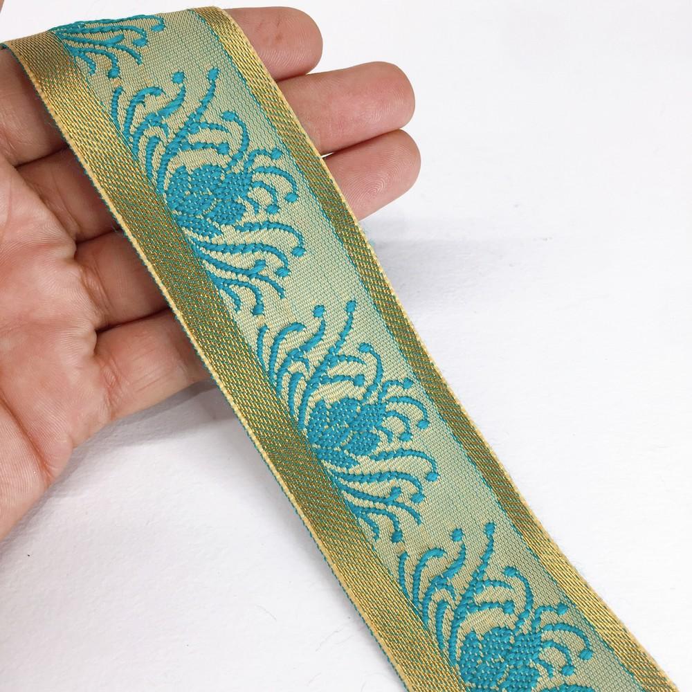 42 mm Designer Colorful Jacquard Lace, shown on white cotton