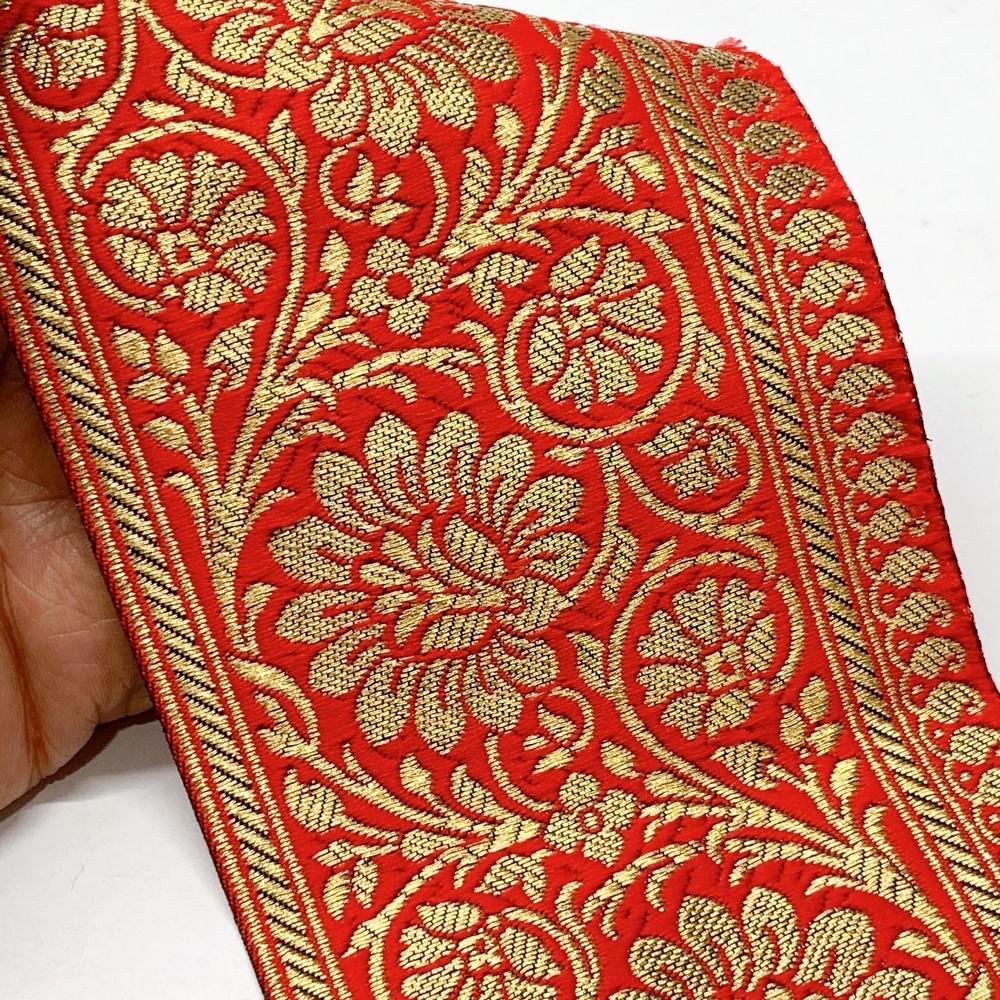 100mm Designer Foral Golden Banarasi Lace, shown on white cotton