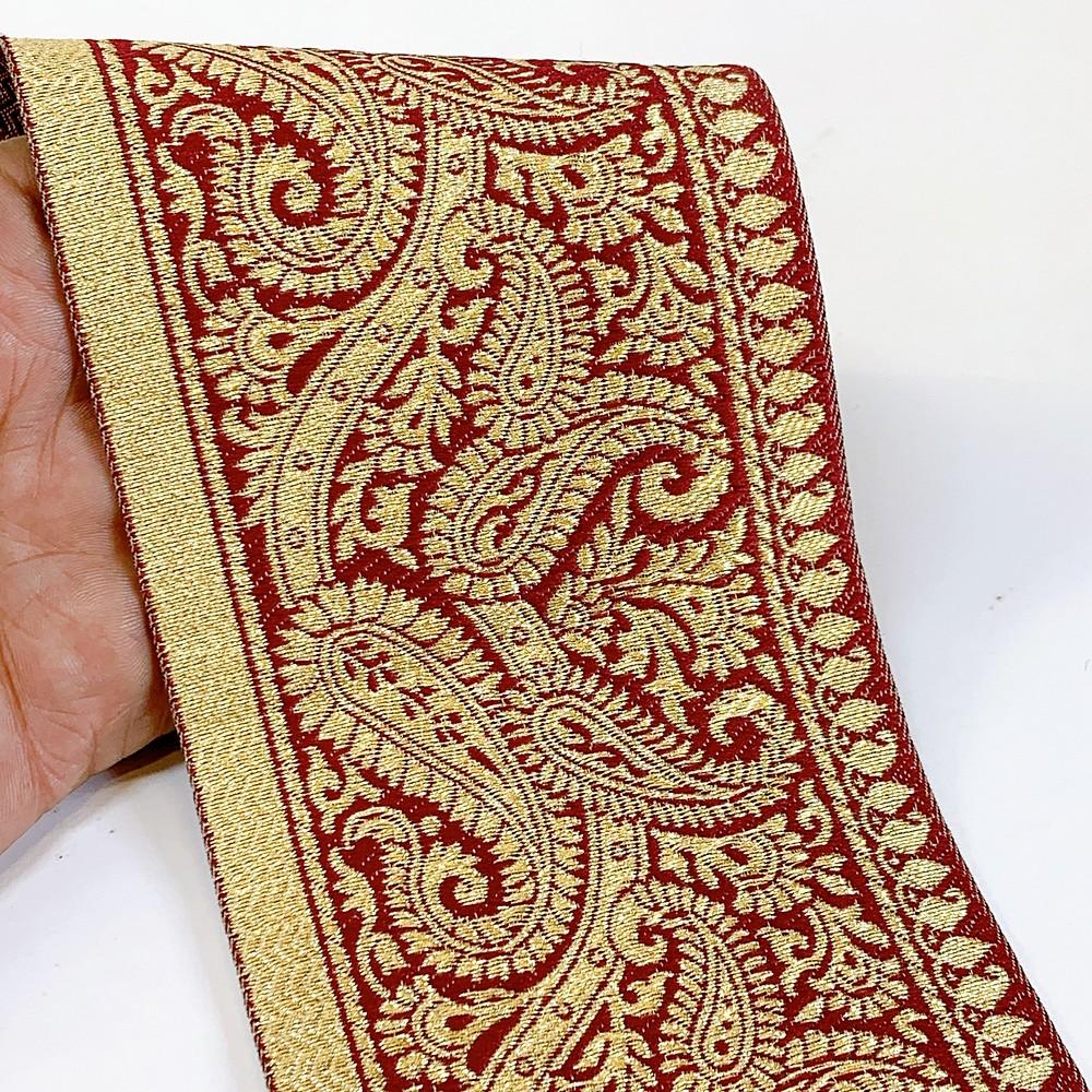 100mm Designer Foral Golden Banarasi Lace, shown on white cotton